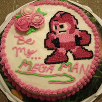 Will You Be My...mega Man For my final cake in Wilton Basics our teacher requested that we do a Valentine's Day cake. My Valentine wanted a Mega Man cake, so I...
