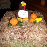 Thanksgiving Cake German Chocolate Cake. Turkey sign says "Eat more Cake". Turkey made with Wilton fondant and gumpaste.