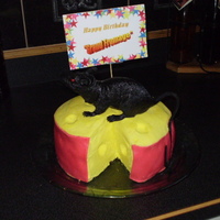 The Big Cheese lemon cake with lemon filling, lemon buttercream with fondant around the outside. It was my bosses birthday and we call him the "grand...