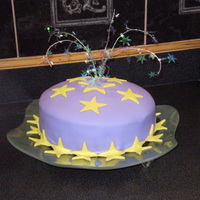Fireworks & Stars vanilla cake with custard filling, covered in fondant with fondant stars. For the "fireworks" I used a star wrapping wire that...