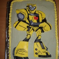 Bumblebee Transformer Cake This is my very first attempt at a real birthday cake, frist time using fondant, and this is also the cake that has now started my...