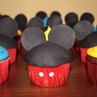 Mickey Mouse Birthday! White and chocolate cupcakes with buttercream icing. Fondant Mickey Mouse head and ears. Made to match the birthday boy's party!