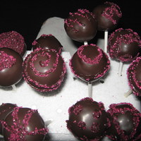 Cake Pops Yellow cake with Chocolate frosting, dark chocolate coating, with pink sprinkles!
