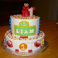 Elmo Birthday Cake 2 tier elmo cake with stripes circles and confetti