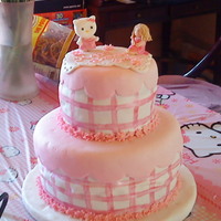 Hello Kitty In Pink This was for a friend's daughter who turned 4 this last weekend. Cakes were white cake with strawberrry cream cheese filling and dark...