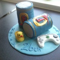 Foster`s Can Birthday Cake Cake I made for a friend`s birthday I stacked circle cut cake then layered and crumb coated with butter cream before i covered it with...