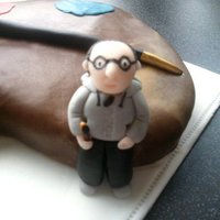 Paint Palette And Painter Birthday Cake chocolate chip cake crumb coated with chocolate ganache then covered with a 2 tone chocolate fondant. The figure is made from a sugar paste...