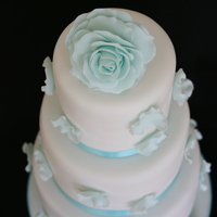 Rose And Rose Petals 3 round tiers, topped with my first gumpaste rose.