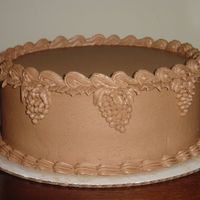 Cake I made this for my wife. Chocolate icing, chocolate cake and chocolate ganache filling. Small leaves under the top border. The icing was...