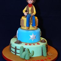 Yee Haa! A 3 tier cake made for a wild west themed party for 2 little boys