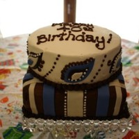 Stripes & Paisley My first attempt at a square cake. My first attempt at a tiered cake. I'm glad I did it but am ready to be REALLY good at this cake...