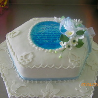 Confirmation Cake Used my cake cricut for the second time. with fondent In the caribbean is very warm so I was having some trouble with it.I would put it in...