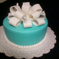 Fondant Bow & Beads My 2nd attempt at fondant. Not as smooth as I like it but a good shot.