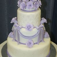 Final Cake Project For Colette Peters Gumpaste & Fondant Course My Final Cake project for Colette Peters Gum-Paste & Fondant Course in Chicago. 3 Tier Fondant covered cake. The fondant is quilted...