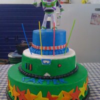 Buzz Lightyear Buttercream, with fondant stars and caution line on top layer