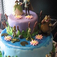 Princess And The Frog Made this cake for my little girls 5th birthday!!! Top layer is white cake with buttercream frosting. The bottom layer is chocolate cake....