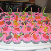 Graduation Cupcakes Made these cupcakes for my little girls VPK graduation. Cupcakes are pink lemonade and with hot pink frosting. Atopped with a fruit gummy...