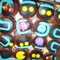 Cupcakes Made these cupcakes for my 10 year old step son....he loved em. It was my first time working with fondant. TFL!!