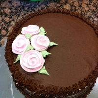 Quick Easter Cake Royal Icing Flowers and chocolate buttercream with yellow cake. Wanted some practice on my flowers, so I decided last minute to whip up a...