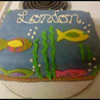London's 1St Birthday Cake personal sized cake. made with white cake and frosted with buttercream and covered with fondant. everything edible.