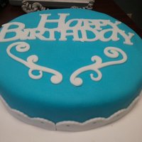 Sky Blue Birthday Cake this is the first cake i have ever made using fondant. is was a 2 layer chocolate cake with handmade buttercream and covered with mmf