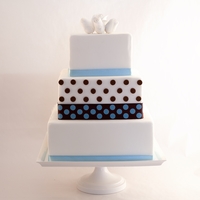 3 Tier Cake Gumpaste roses and dots.