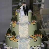 Wedding Cake A bride saw cakesbyanh's nature cake on this site and fell in love with it, but wantedbuttercream icing instead. So here's my...
