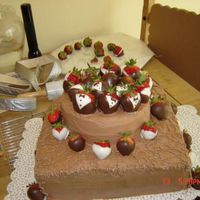 30Th Birthday Yellow cake with chocolate butter cream. Chocolate dipped strawberries. Not my most favorite cake. The birthday boy loved it everyone took...
