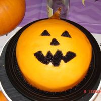 Pumpkin Smile!!! Chocolate cake with MMF...I made this cake for a tasting which got me a large wedding cake...yayaya