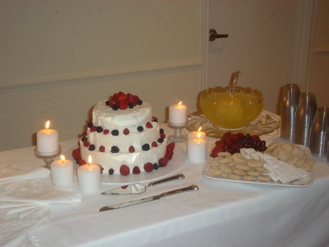 My Wedding Cake We wanted something very simple. We made 12", 10", 8" rounds all white velvet cake with whipped topping and berries. I was...