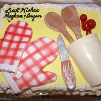 Kitchen Shower this was for a kitchen shower. Oven mitts, wooden spoons, and knife all mmf. Container and measuring spoons were chocolate.