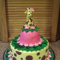 Suprise Giraffe Cake! I posted a pic a few weeks ago of just the giraffe topper , here is the finished cake. I made this for my daughters birthday since she is a...