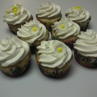 Pineapple Pineapple cupcakes with homemade whipped cream frosting.