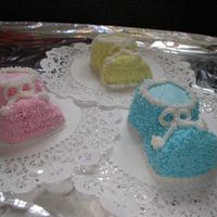 Baby Booties These are the baby booties I made for a cousins shower. Used 2 cupcakes and BC.