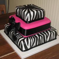 Square Zebra Cake zebra stripe cake before the flowers were added. Flowers were hot pink gerber daisies