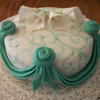 Drapes, Vines, And Calla Lilies I'm very please with this cake. It was my first time doing drapes, callas, and paintings. I think it turned out quite well. I've...