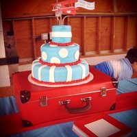 Vintage Airplane Themed 4 Year Old Birthday! 3-tier pound cake filled with lemon butter cream and covered in marshmallow fondant