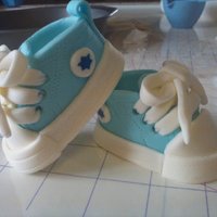 Fondant Baby Converse Booties These are my first time making these and they turned out very adorable. I used marshmallow fondant. They were very fun and easy to make...