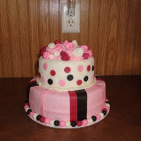 Girly Birthday Cake =] 8 inch with 6 inch on top, both chocolate cake with peanut butter cup filling.