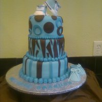 Blue And Brown Shower Cake 3-tiered cake of dots, zebra prints and stripes...this is the cake I used the converse boy shoes on...I so miss the shoes...guess I got to...
