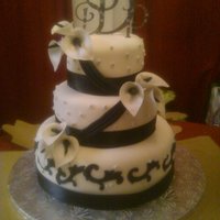 A Black N White Affair-Davis Wedding Nov 2010 This cake was created for a friend for her wedding day...the theme of course is black and white...I saw so many awesome ideas, so my...