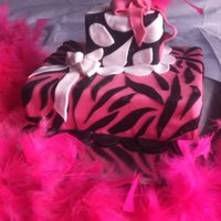 Animal Print This cake is in cow print and zebra print....