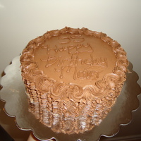 Birthday Cake For My Mom made this for my mom chocolate cake, filled with raspberry mouse filling, topped and decorated with chocolate buttercream
