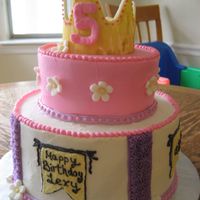Princess Lexy I made this to match the birthday girl's invitations for a tea/princess party. All BC with a fondant crown.