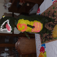 Danielle's 3Rd Birthday Party - T-Rex Cake dinosaur cake - first cake with a armature - only my 2nd-3rd cake that would be more than just the average duncan hines with frosting type...