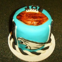 Mini Eagles Cake Mini Eagles cake for a friend. Hand drew the Eagles emblem on MMF