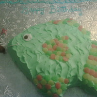 Gone Fishen A vanilla cake with buttercream icing and candy accents with a chocolate covered wormmie.