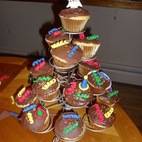 New Year's Eve Cupcakes New Year's Eve cupcakes with fondant decorations, except for the white chocolate star on top