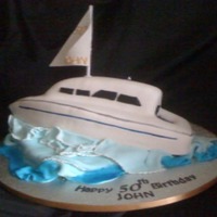 Yacht Cake Hand carved lemon cake with lemon curd buttercream.
