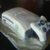Xbox 360 Cake yellow and chocolate cake with buttercream frosting and MM fondant the controller is rice krispie treats with fondant "buttons"...